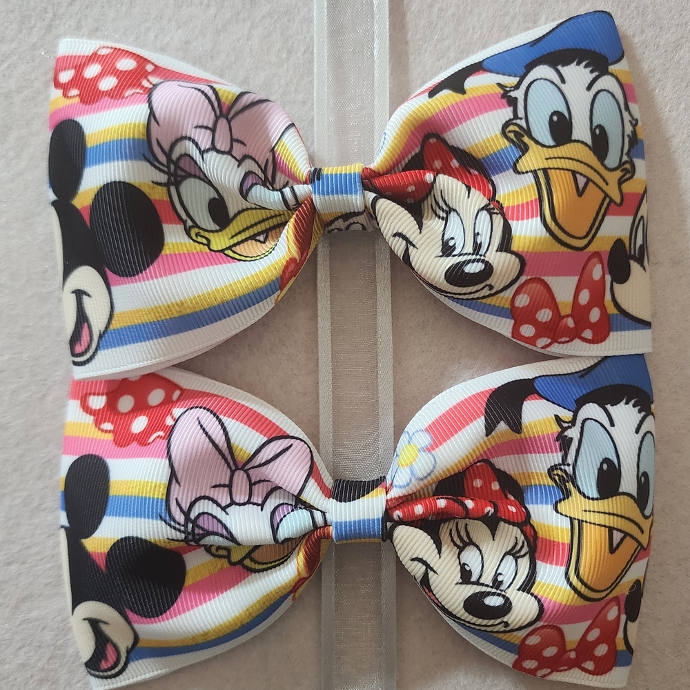 Disney Red and Pink Hair Accessories with Daisy and Donald Pair For 10.00